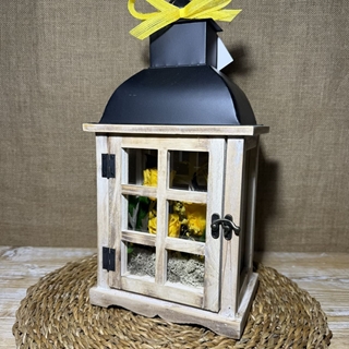 Candelabro marrón en tonos amarillos - Imagen 1