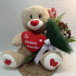 Oso de peluche con un ramo de rosas en la mano - Imagen 1